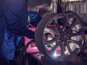 Mechanic with tools in auto repair shop