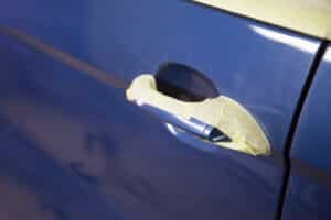 mask of a car's door handle