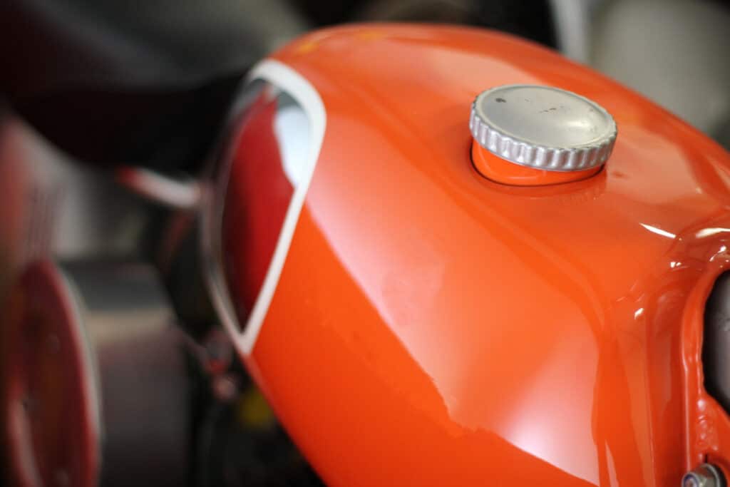 Sunset orange painted motorcycle tank 