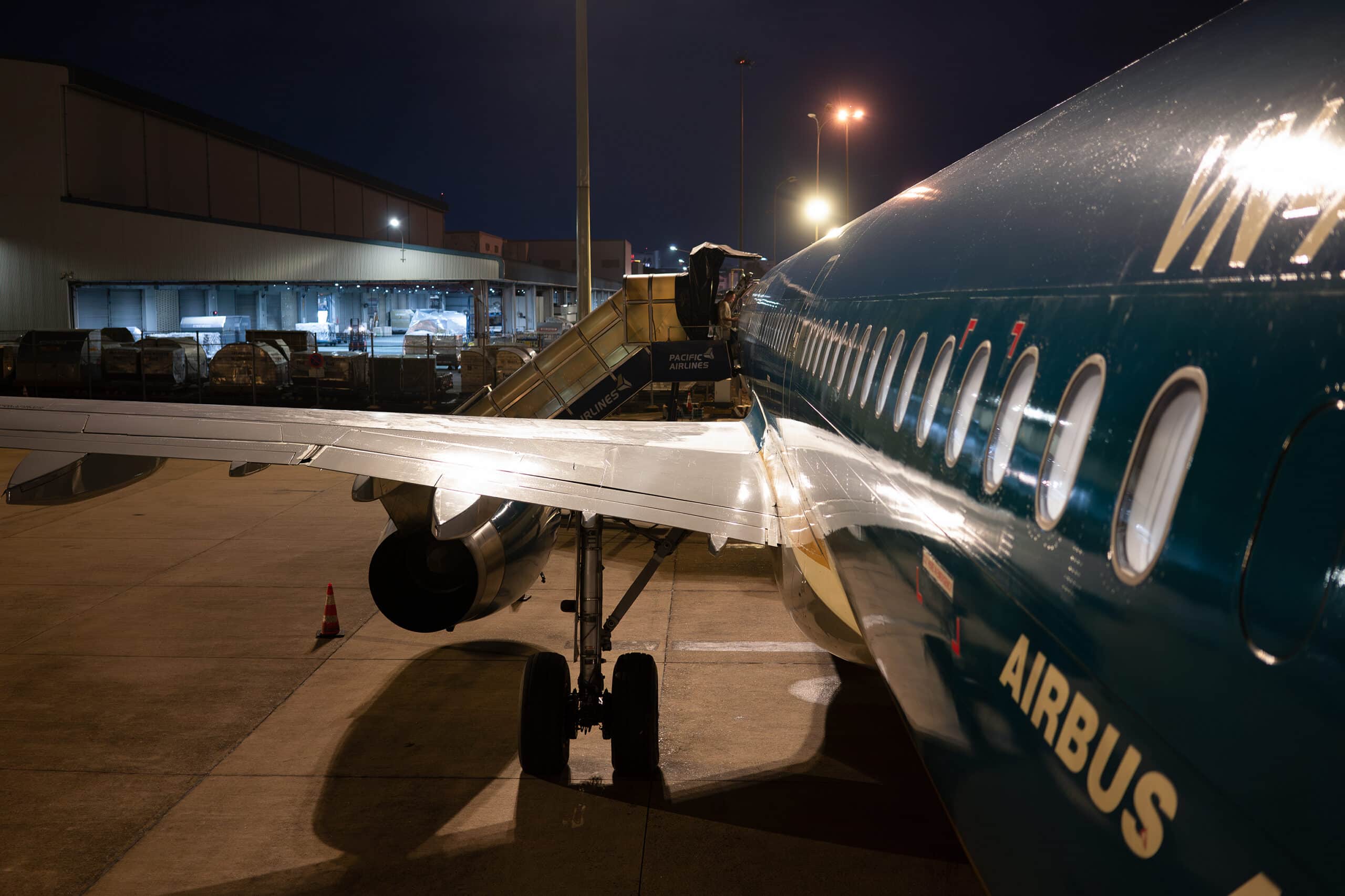 Ho Chi Minh City, Vietnam - May 10, 2025: view from airstairs of Airbus A321 operated by Pacific Airlines in Vietnam Airlines livery.